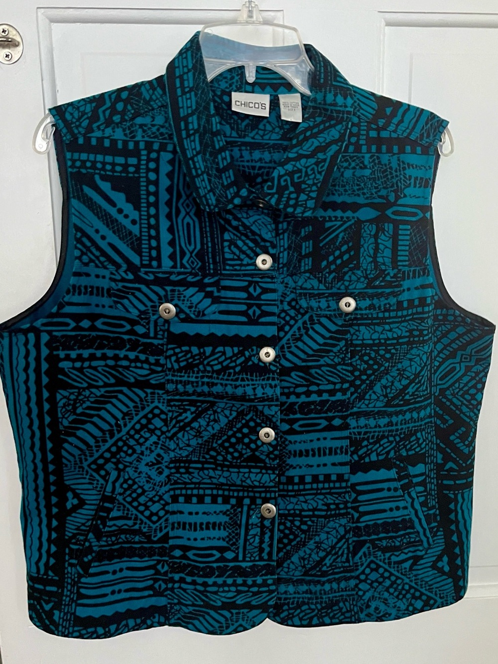 Chico’s size 2 equivalent to L teal black geometric print vest